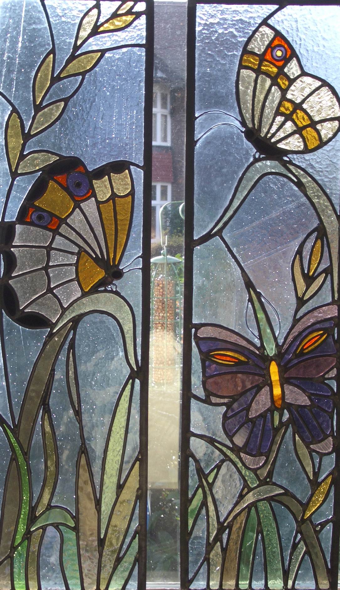 Butterfly panels for an double panelled door
